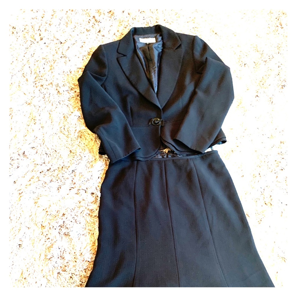 Black Tahari suit.